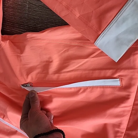 Lululemon Sun Showers Rain Jacket in Grapefruit/White Size 6