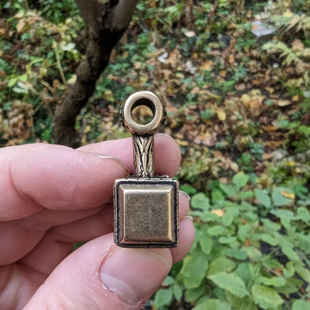 Svarog hammer pendant from bronze